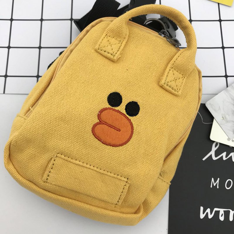 mochila-moderna-perros-raijuu-03.jpg Mochila moderna para perros amarilla con cara de patito